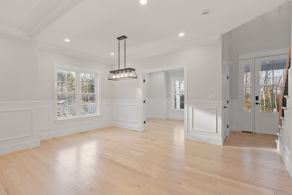 171 Upper Gore Road Webster, MA 01570 - Photo 7 of 42 a view of empty room with window and wooden floor
