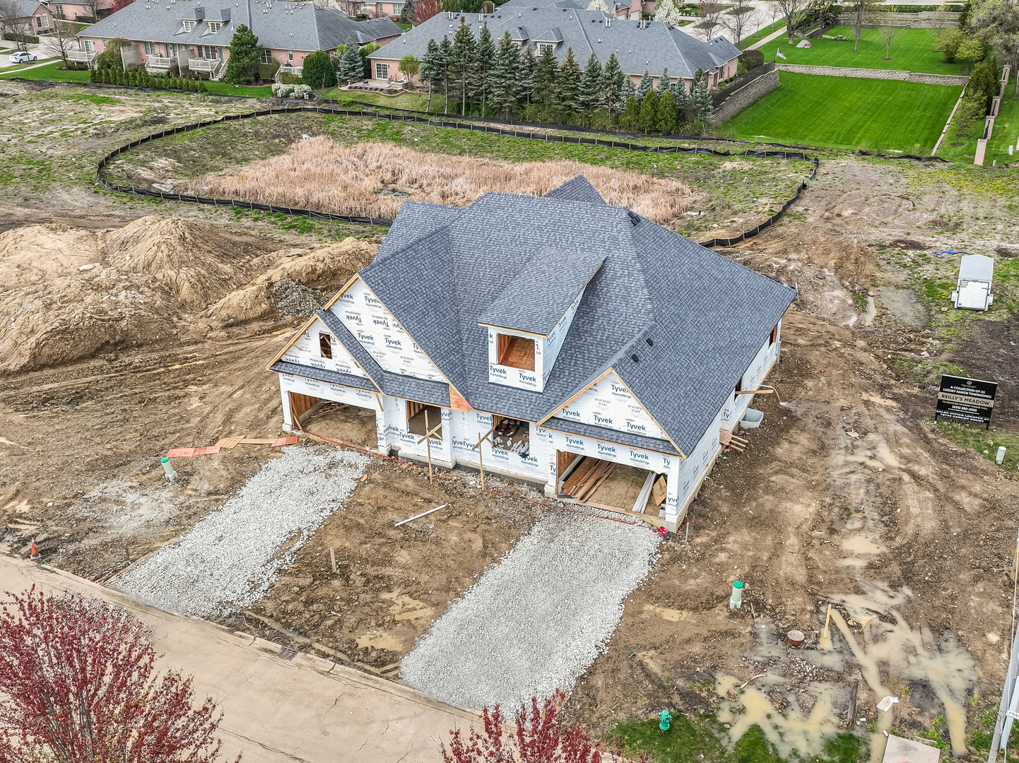 1224 Prairie Lane Lemont, IL 60439 - Photo 3 of 18 an aerial view of a house with a big yard and large trees