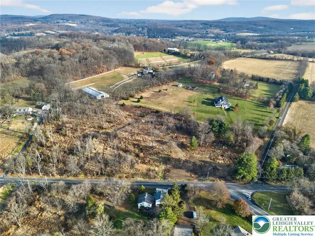 a view of residential houses with outdoor space
