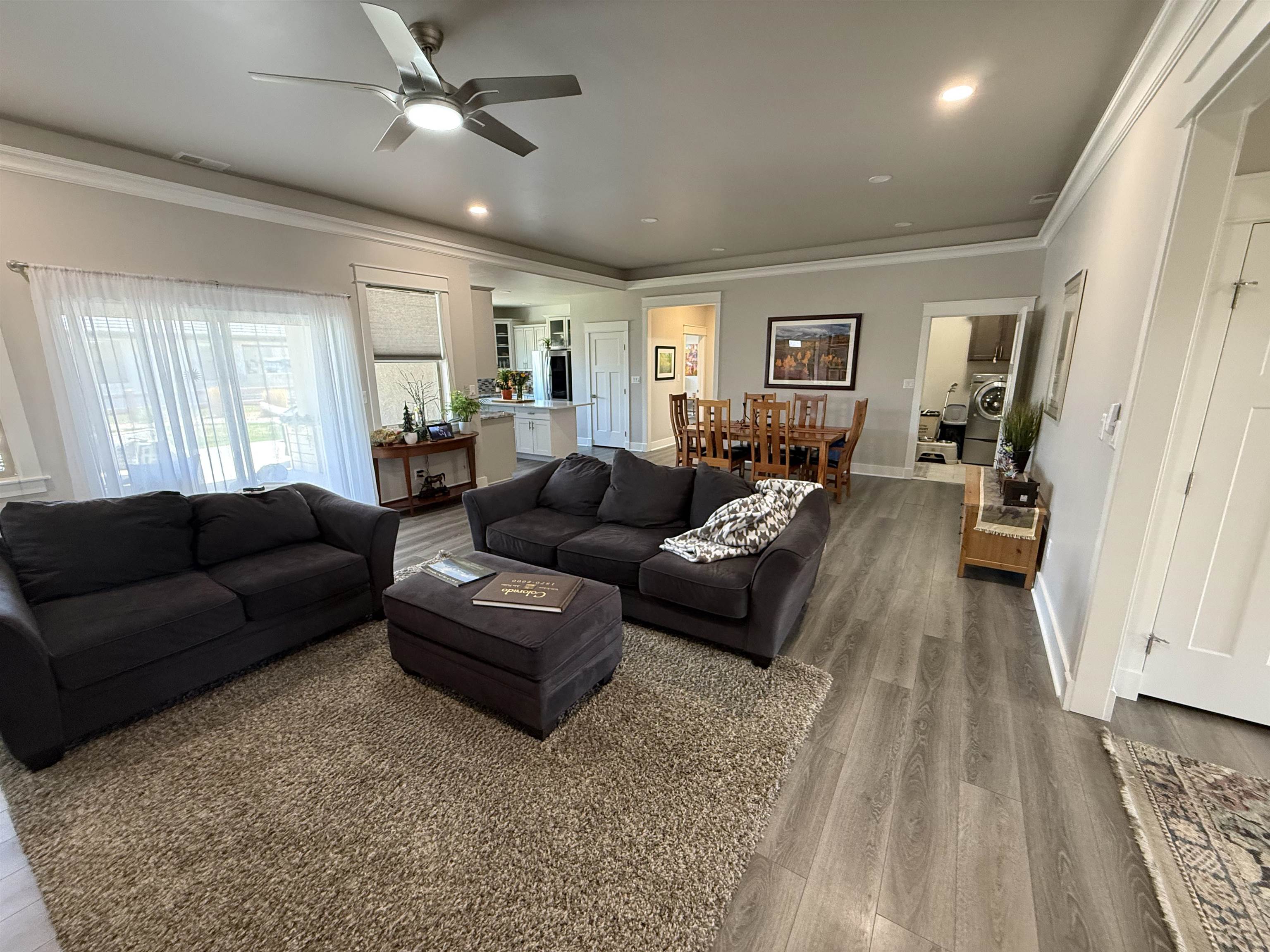 1210 Fairway Drive Fruita, CO 81521 - Photo 14 of 33 a living room with furniture and a wooden floor