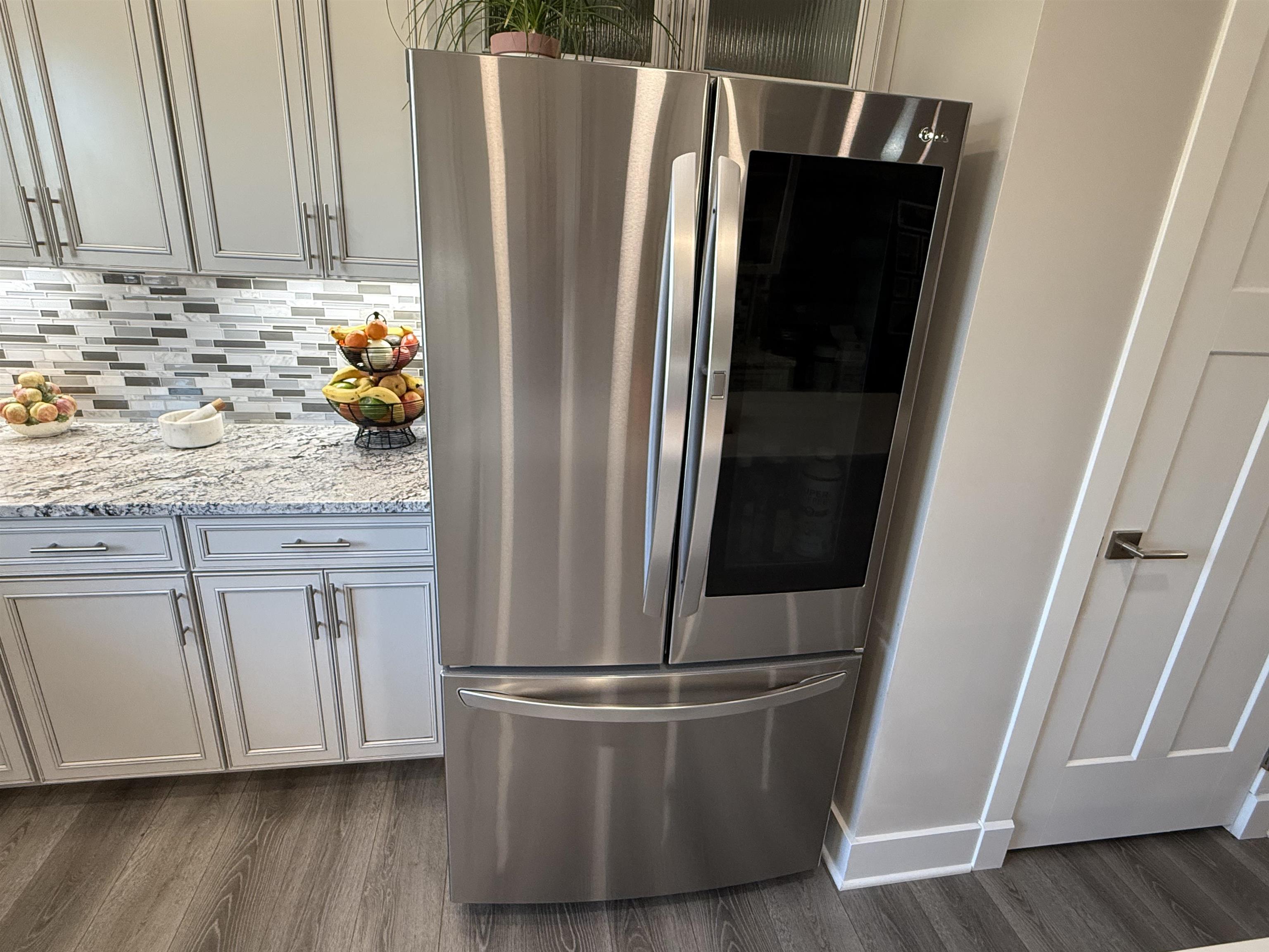 1210 Fairway Drive Fruita, CO 81521 - Photo 19 of 33 a white refrigerator freezer sitting inside of a kitchen