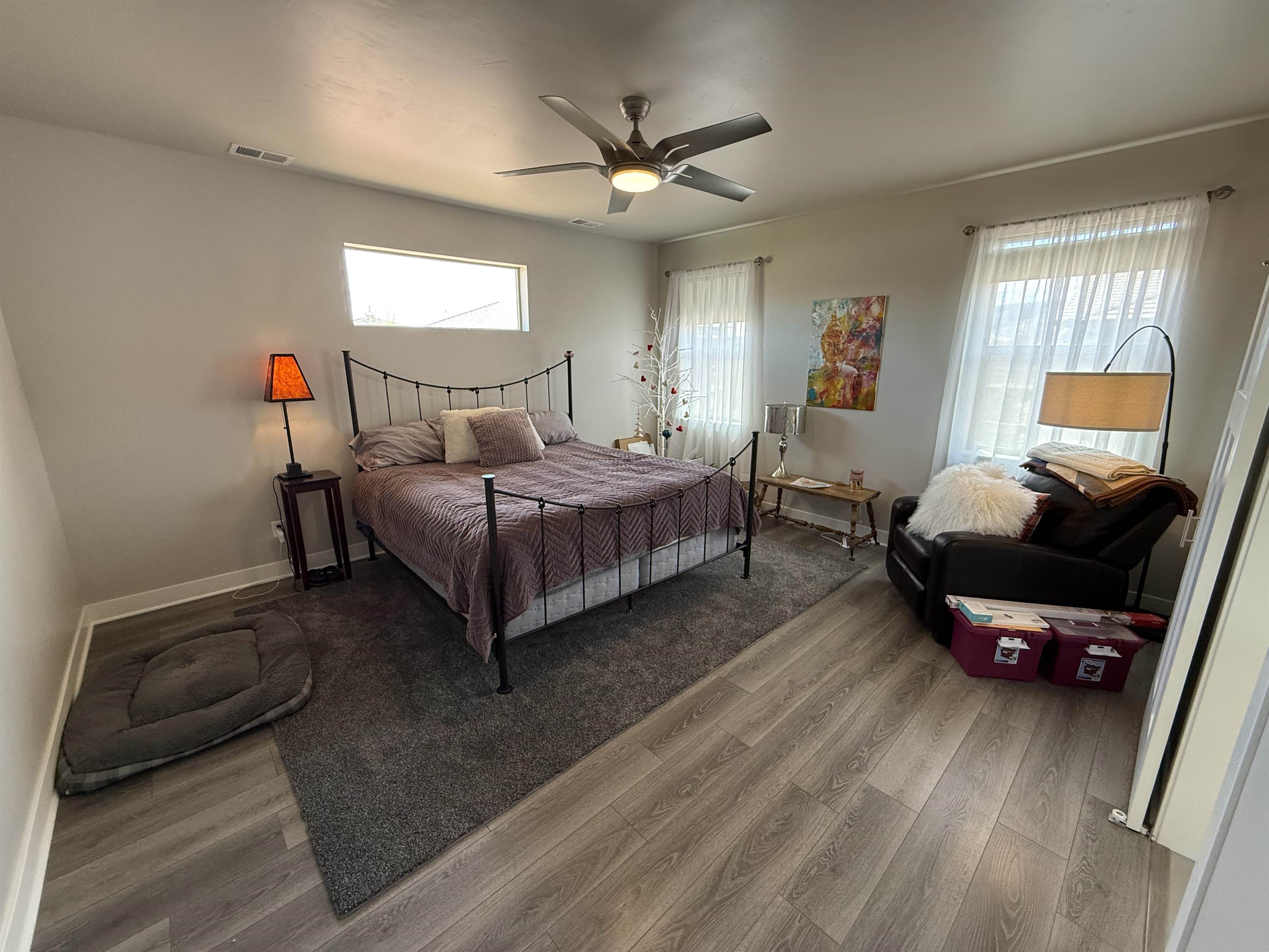 1210 Fairway Drive Fruita, CO 81521 - Photo 21 of 33 a living room with a bed furniture and a window