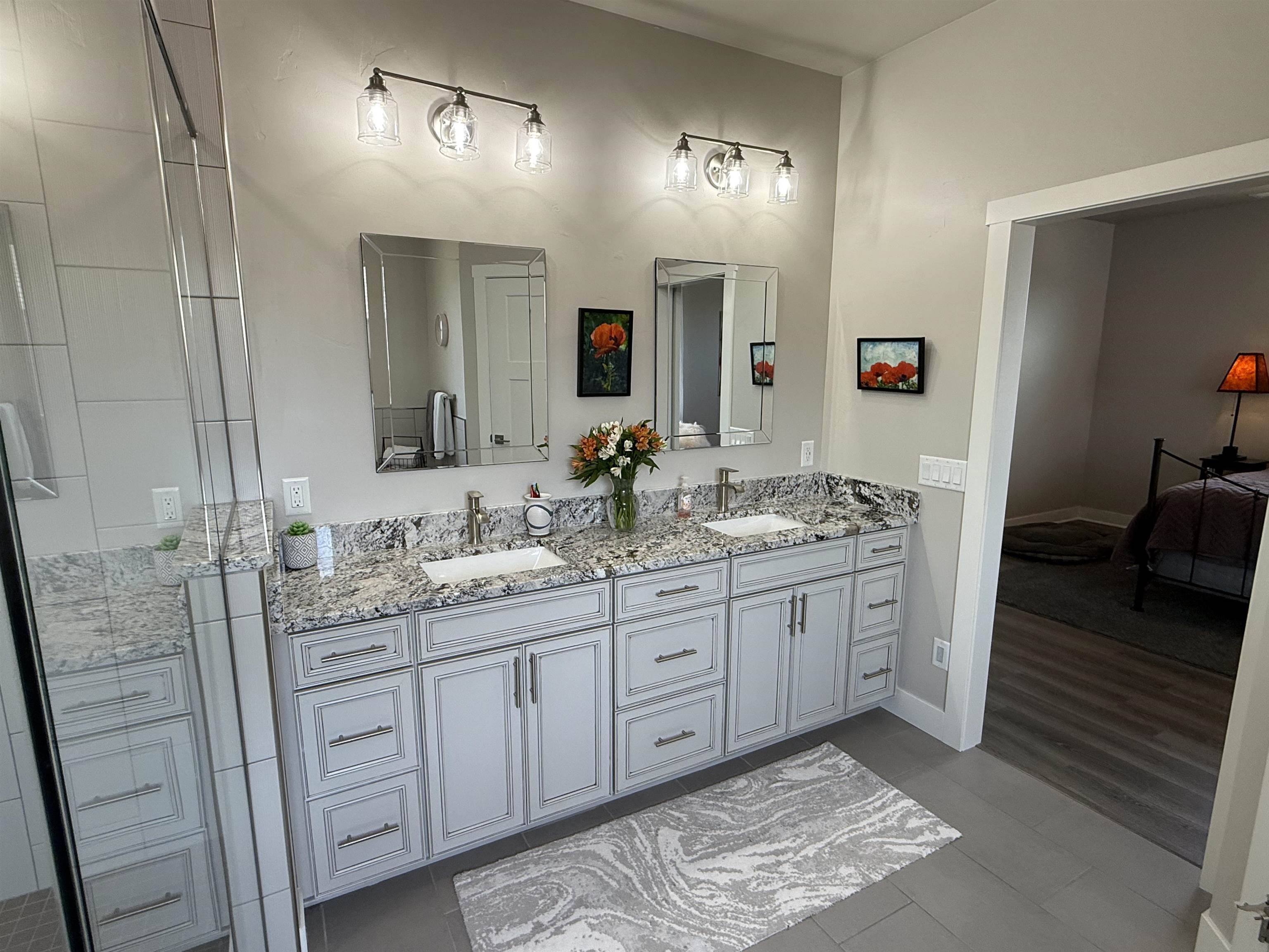 1210 Fairway Drive Fruita, CO 81521 - Photo 24 of 33 a bathroom with double vanity sink and a mirror