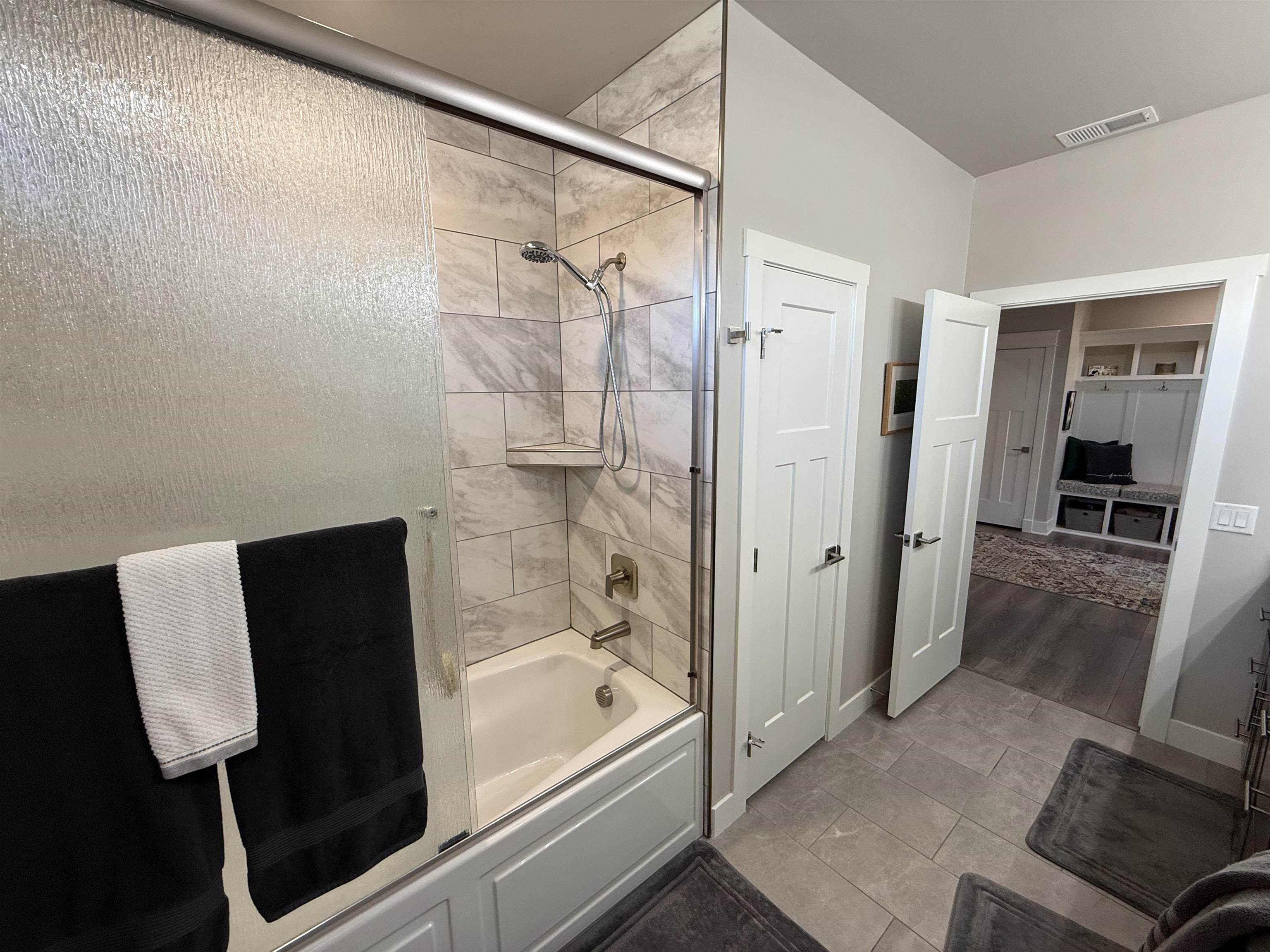 1210 Fairway Drive Fruita, CO 81521 - Photo 31 of 33 a bathroom with a bathtub and a shower