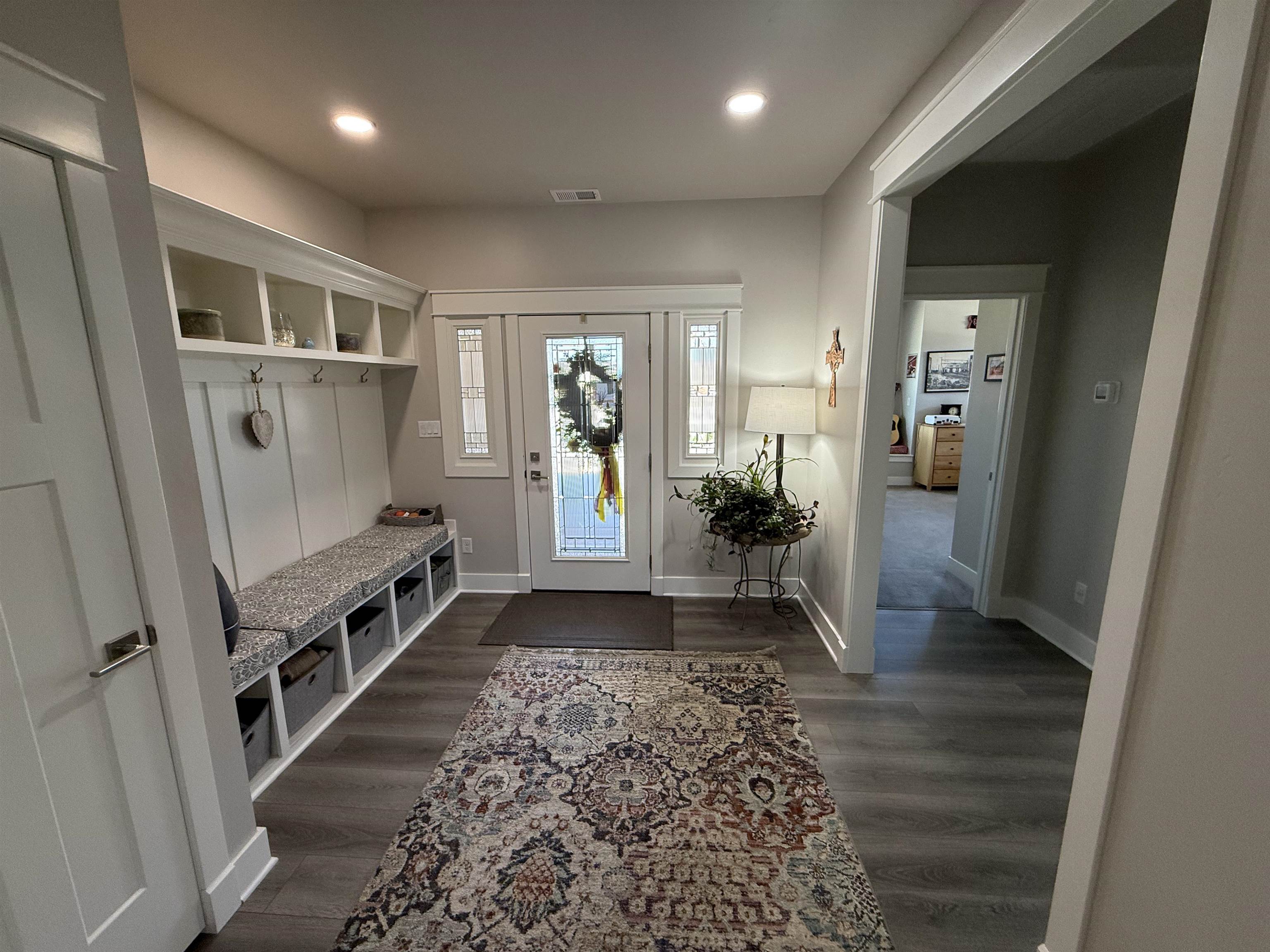 1210 Fairway Drive Fruita, CO 81521 - Photo 10 of 33 a view of hallway with living room and wooden floor
