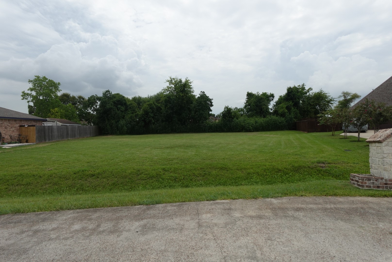 0 Violet View Drive Highlands, TX 77562 - Photo 6 of 7 a view of a golf course with a lake