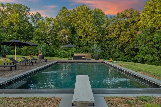 a view of a lake with a yard