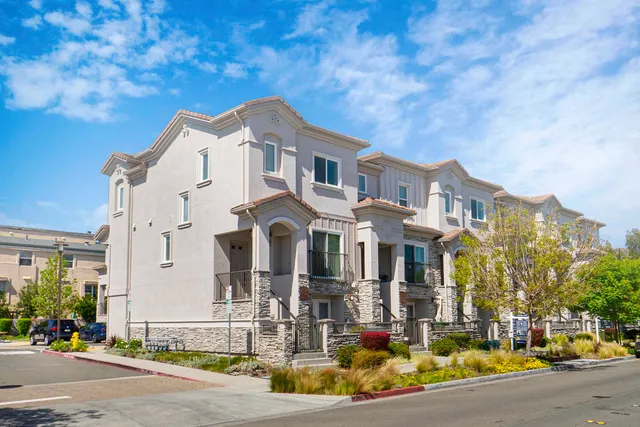 a front view of a building with street view