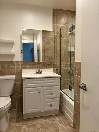 a bathroom with a sink and a shower
