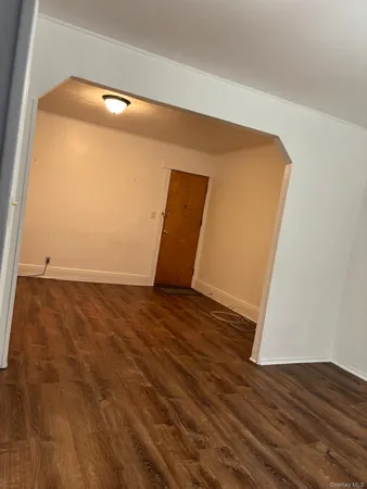 a view of a big room with wooden floor