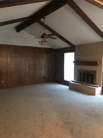 a view of a livingroom with a fireplace