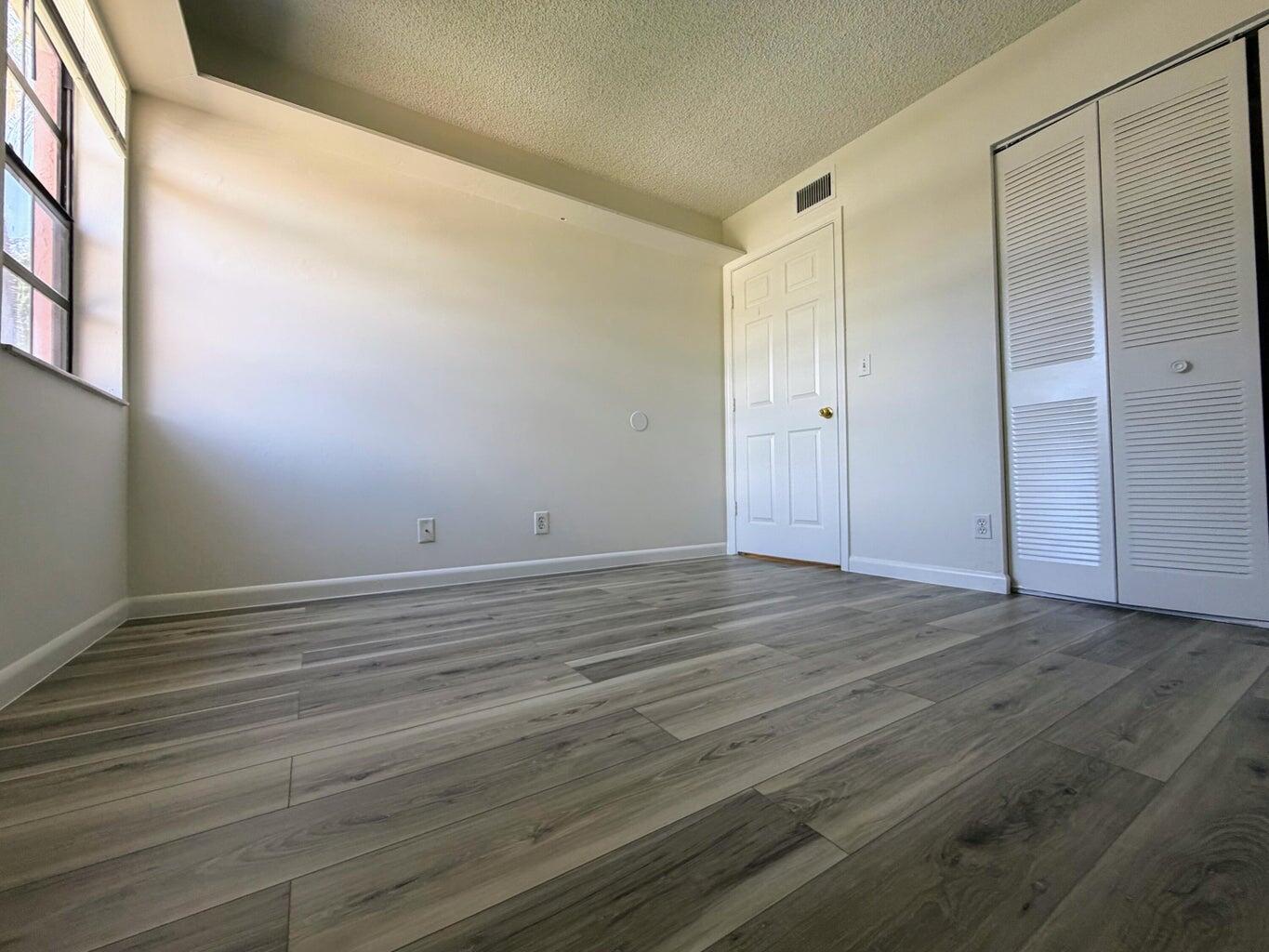 3160 Leewood Terrace, Unit L115 Boca Raton, FL 33431 - Photo 12 of 16 2nd bedroom