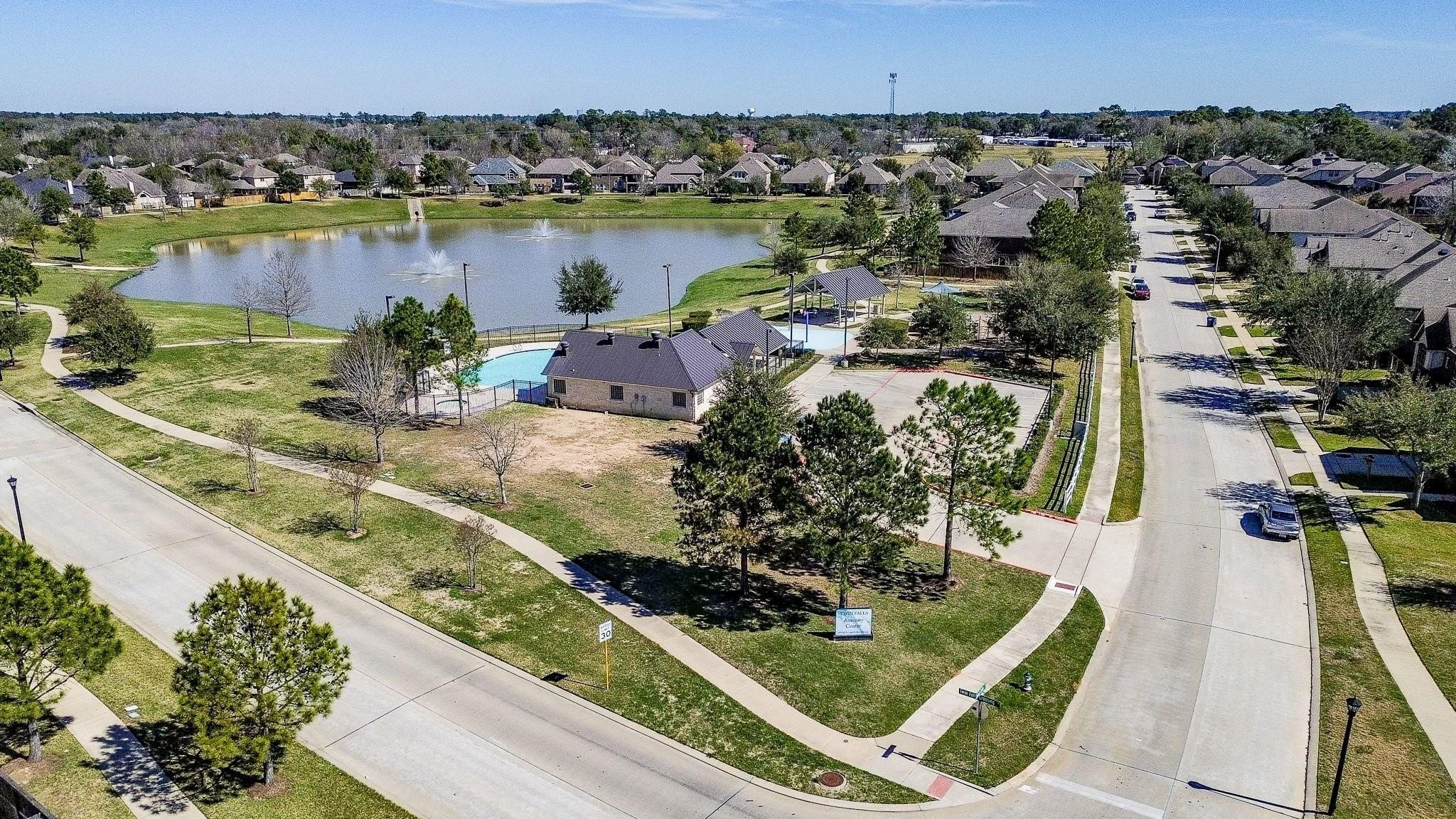 7042 Sliding Rock Circle Spring, TX 77379 - Photo 31 of 36 Stunning views of the serene Twin Falls Community, featuring picturesque landscapes and a welcoming neighborhood atmosphere.