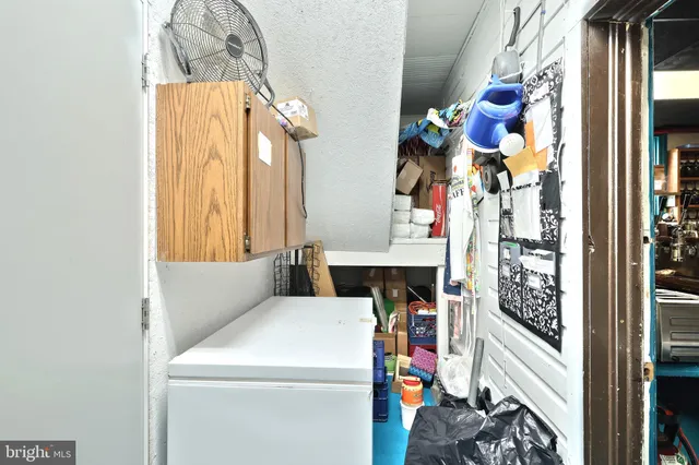 a kitchen with granite countertop cabinets and sink