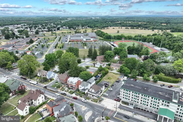 an aerial view of a city with lots of residential buildings