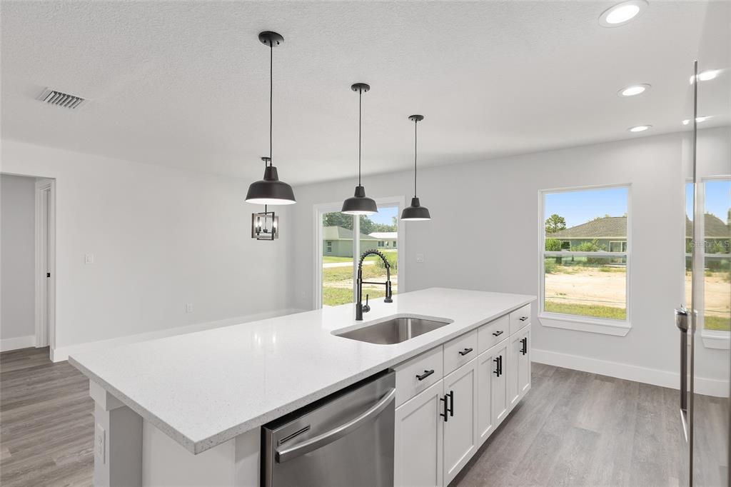 15769 Southwest 14th Street Ocala, FL 34481 - Photo 19 of 46 a kitchen with sink and window