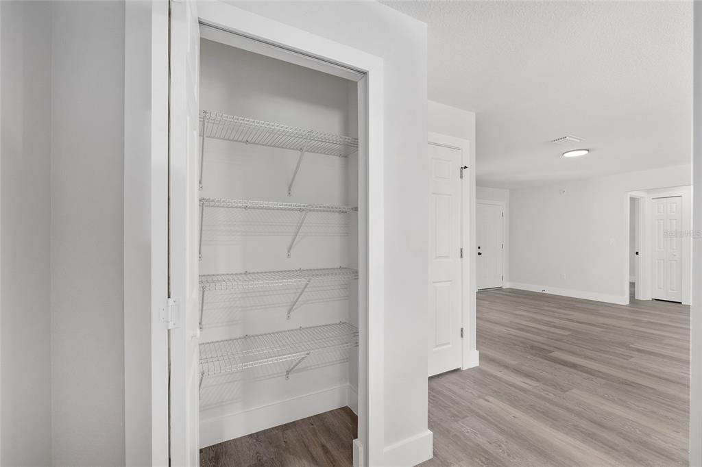 15769 Southwest 14th Street Ocala, FL 34481 - Photo 20 of 46 a view of empty room with wooden floor
