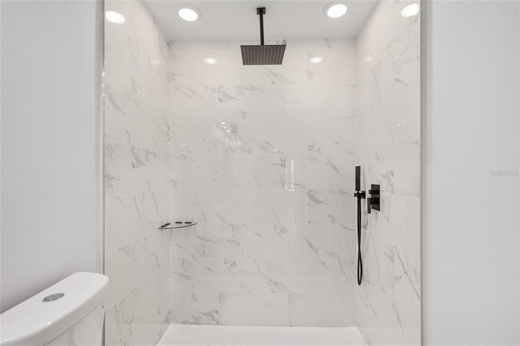 15769 Southwest 14th Street Ocala, FL 34481 - Photo 30 of 46 a bathroom with a shower