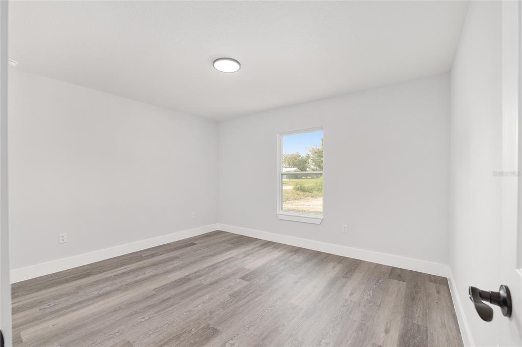 15769 Southwest 14th Street Ocala, FL 34481 - Photo 34 of 46 an empty room with a window