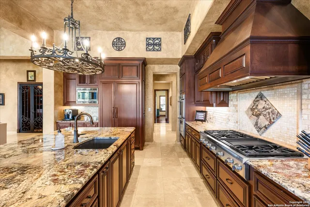 a view of a hallway with living room and furniture