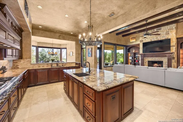 a bedroom with a large bed and a couch