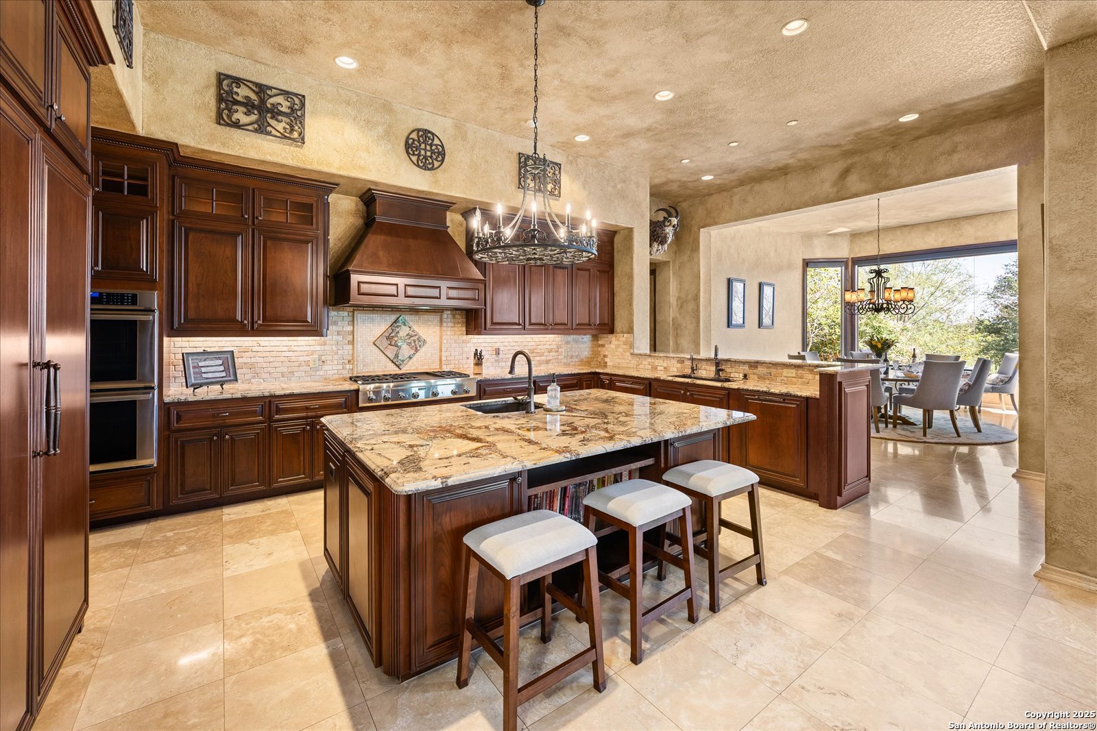 210 Rio Cordillera Boerne, TX 78006 - Photo 21 of 78 a kitchen with a stove a counter top space and stainless steel appliances