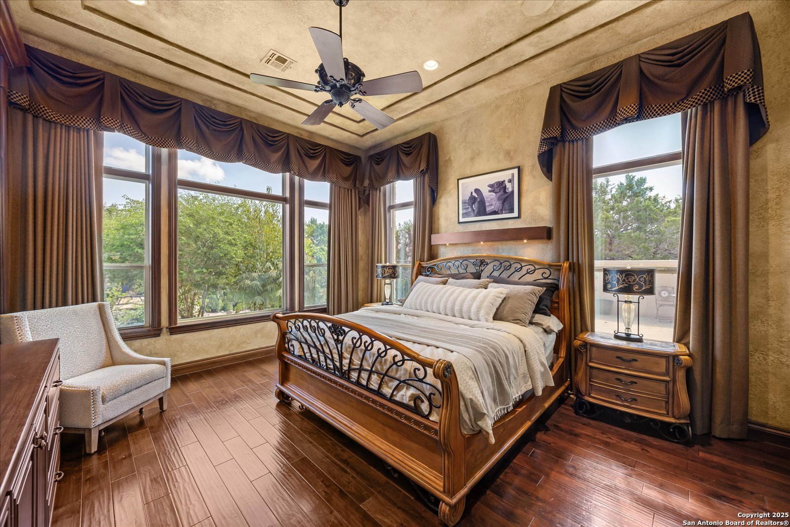 210 Rio Cordillera Boerne, TX 78006 - Photo 29 of 78 a bedroom with a large bed and a couch