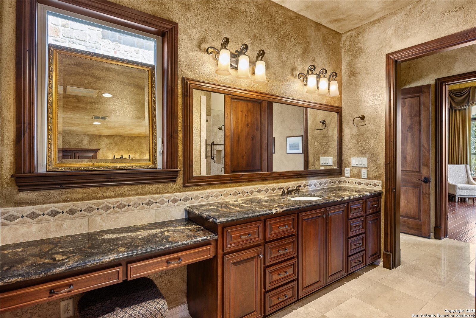 210 Rio Cordillera Boerne, TX 78006 - Photo 36 of 78 a bathroom with a granite countertop sink and large window