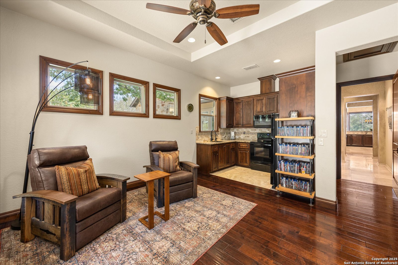 210 Rio Cordillera Boerne, TX 78006 - Photo 44 of 78 a living room with furniture and a wooden floor