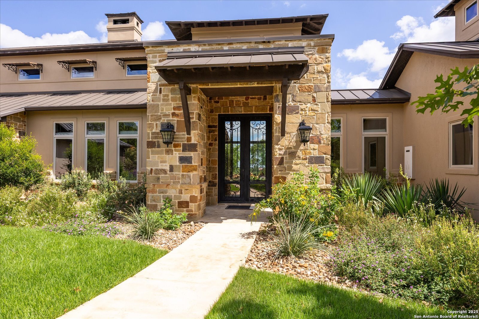 210 Rio Cordillera Boerne, TX 78006 - Photo 6 of 78 a front view of a house with garden