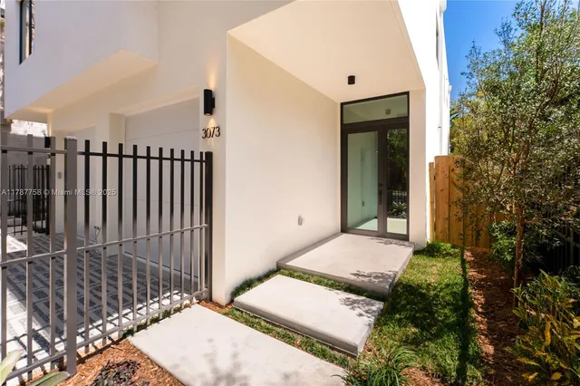 a view of backyard of a house