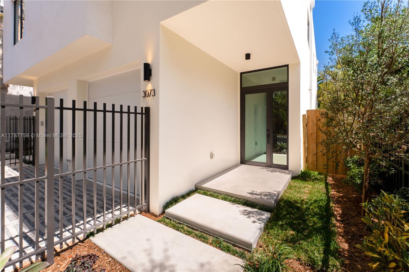 3073 Hibiscus Street, Unit 1 Miami, FL 33133 - Photo 24 of 27 a view of backyard of a house