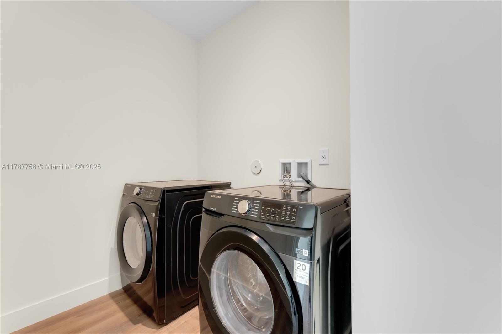 3073 Hibiscus Street, Unit 1 Miami, FL 33133 - Photo 26 of 27 a utility room with dryer and washer