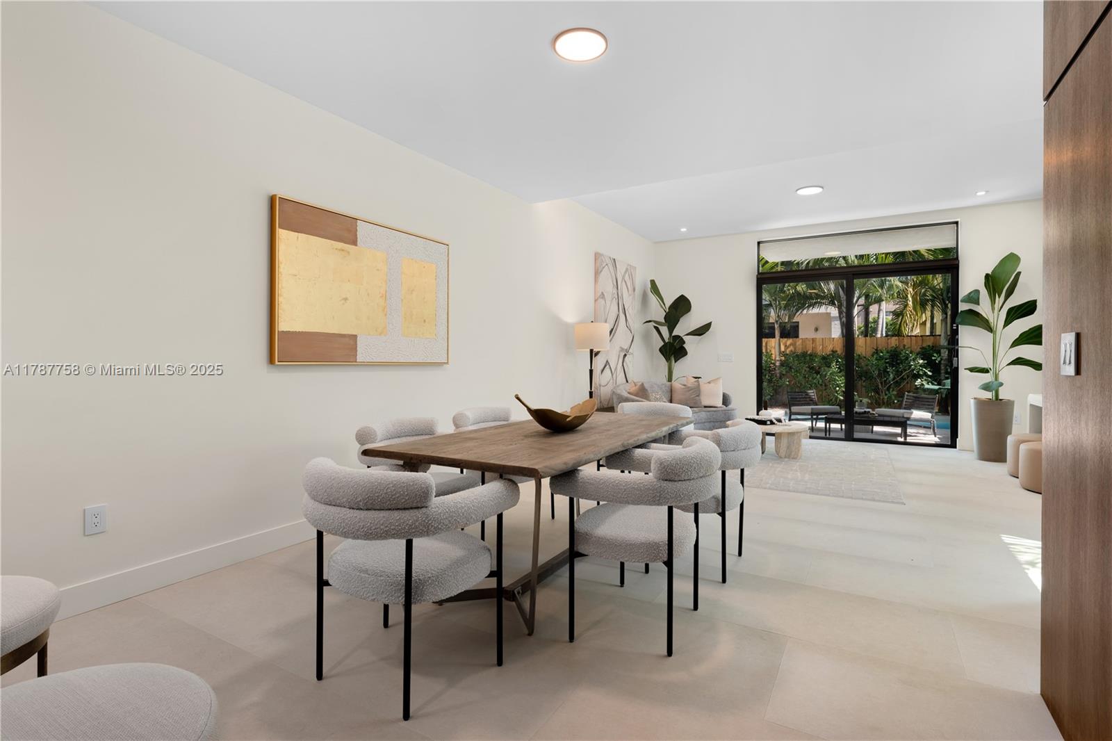 3073 Hibiscus Street, Unit 1 Miami, FL 33133 - Photo 5 of 27 a view of a livingroom with furniture and window