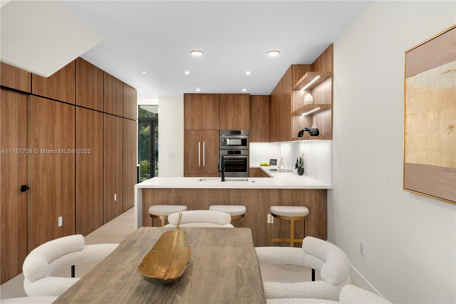 3073 Hibiscus Street, Unit 1 Miami, FL 33133 - Photo 6 of 27 a living room with stainless steel appliances furniture a couch and a window