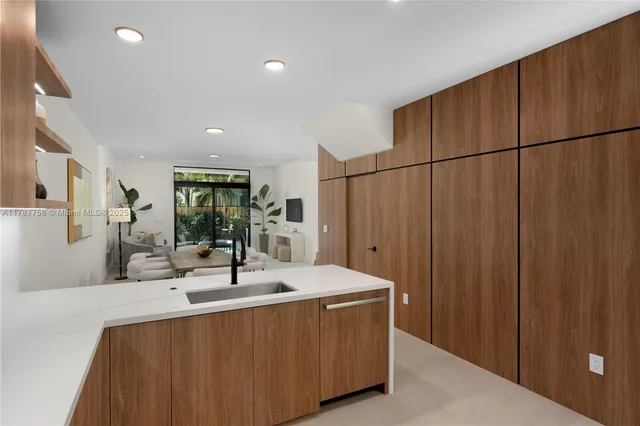 a bathroom with a sink and mirror