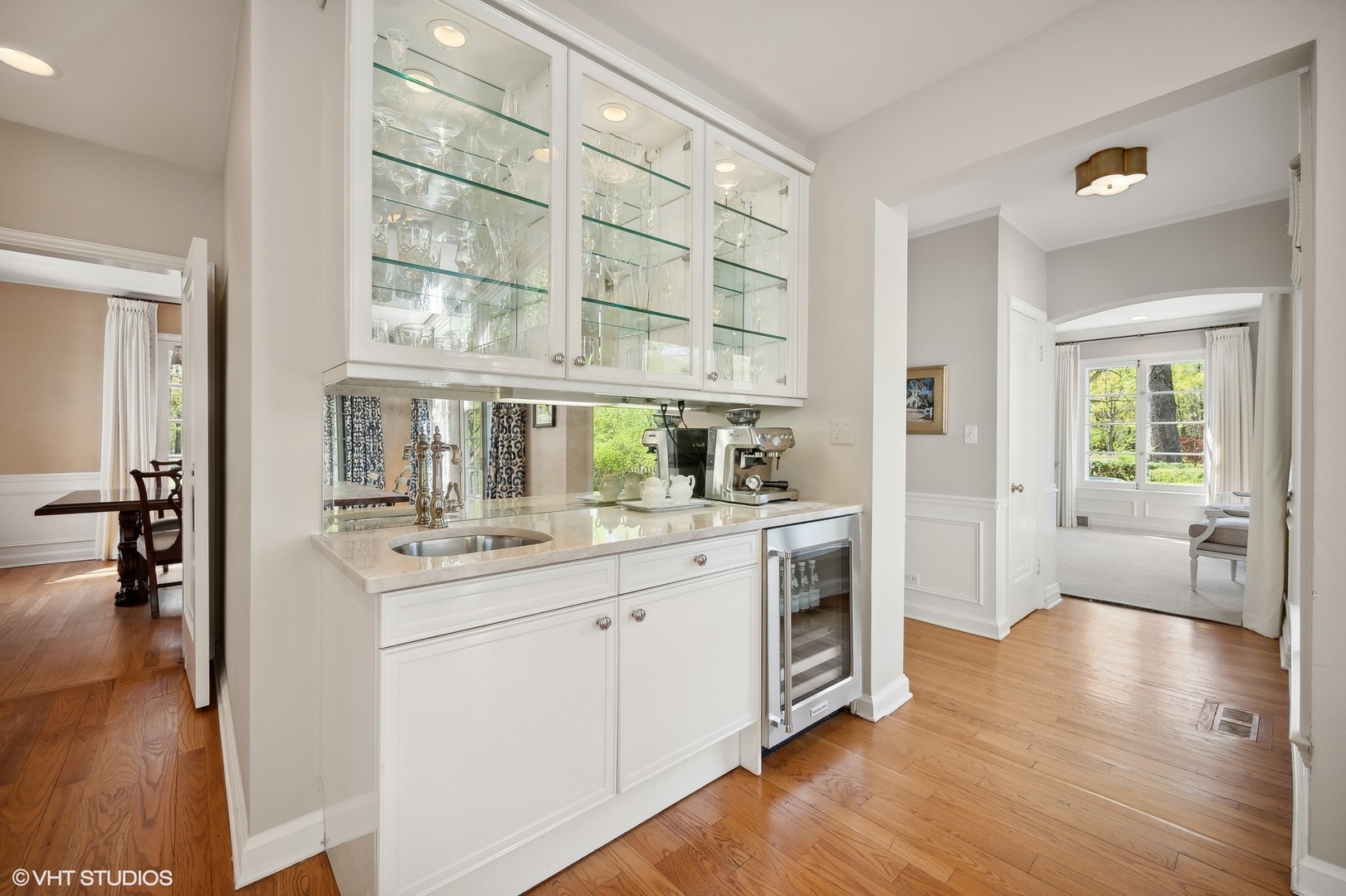 1744 Ridgewood Lane East Glenview, IL 60025 - Photo 18 of 48 a kitchen with a sink cabinets and wooden floor