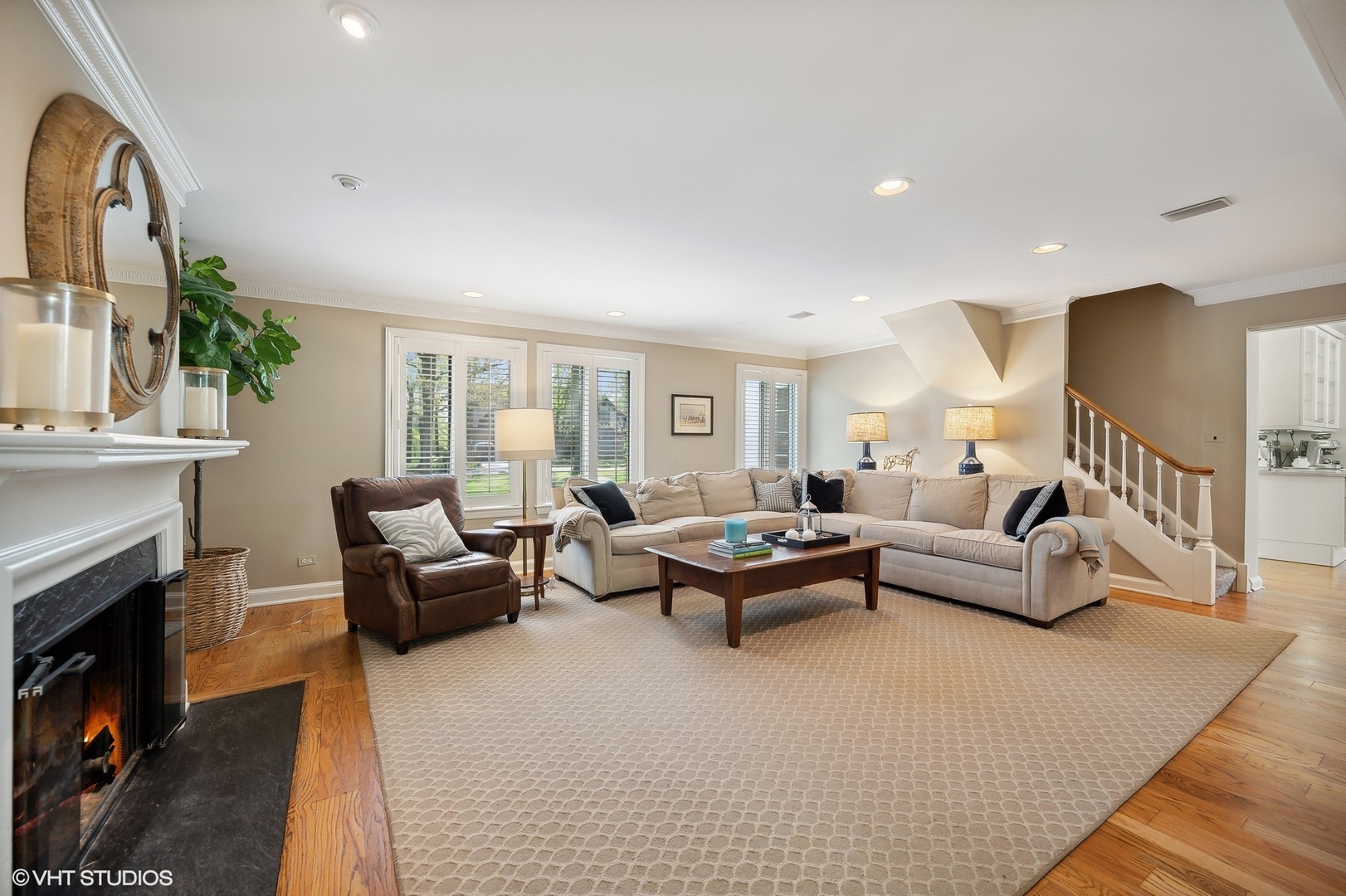 1744 Ridgewood Lane East Glenview, IL 60025 - Photo 24 of 48 a living room with furniture and a fireplace