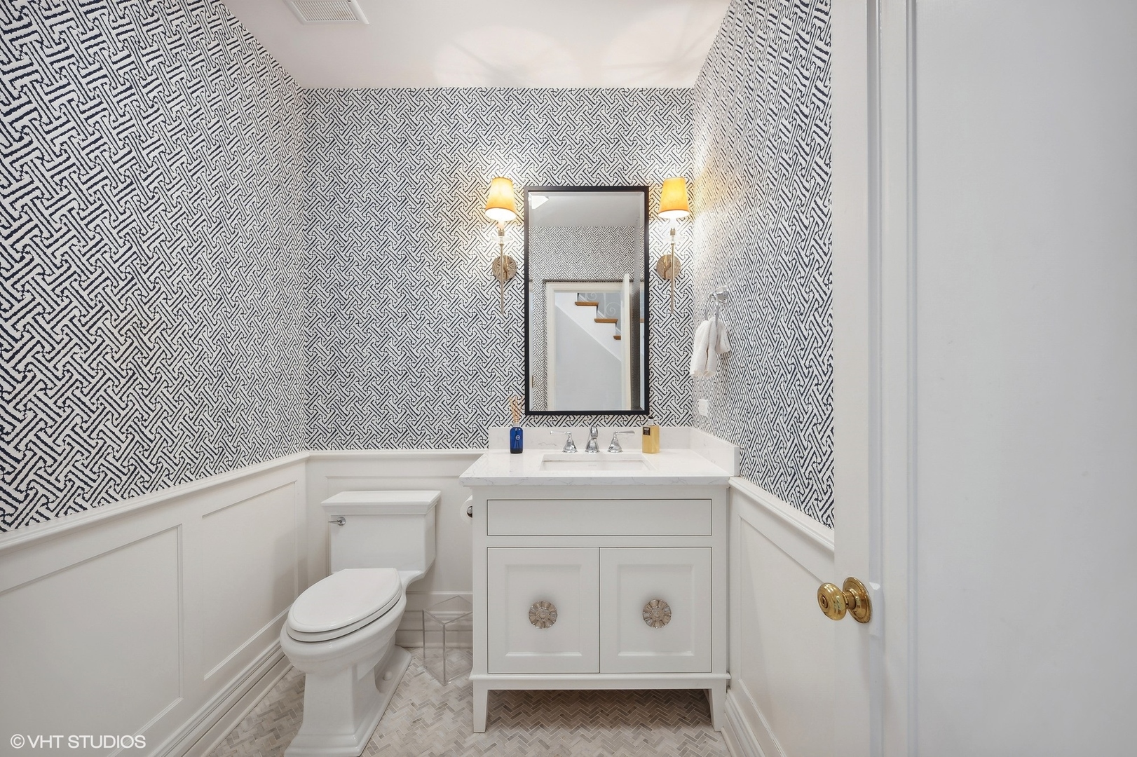 1744 Ridgewood Lane East Glenview, IL 60025 - Photo 26 of 48 a bathroom with a sink a toilet and mirror