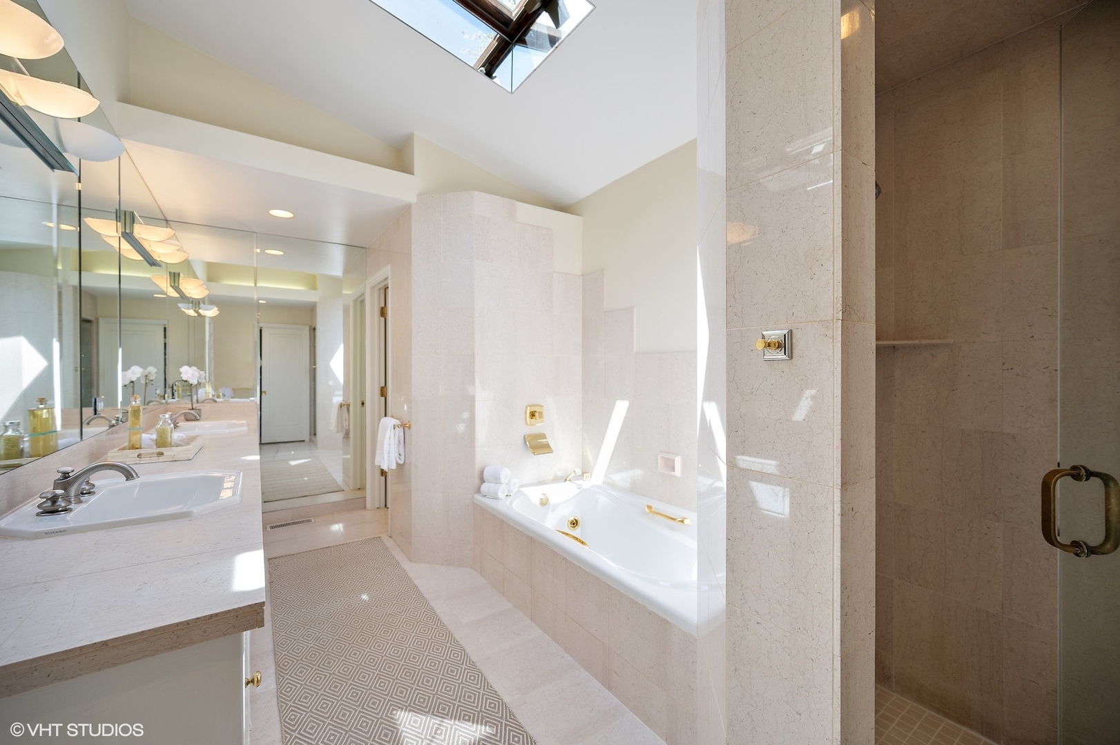 1744 Ridgewood Lane East Glenview, IL 60025 - Photo 30 of 48 a large white room with a mirror and a bath tub