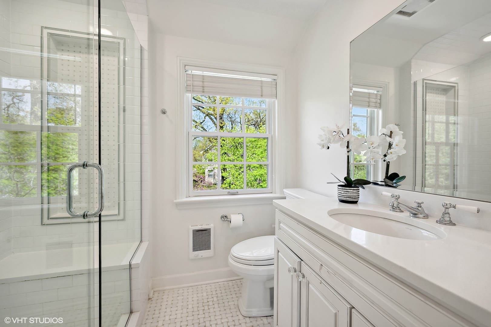 1744 Ridgewood Lane East Glenview, IL 60025 - Photo 32 of 48 a bathroom with a granite countertop sink a toilet and shower