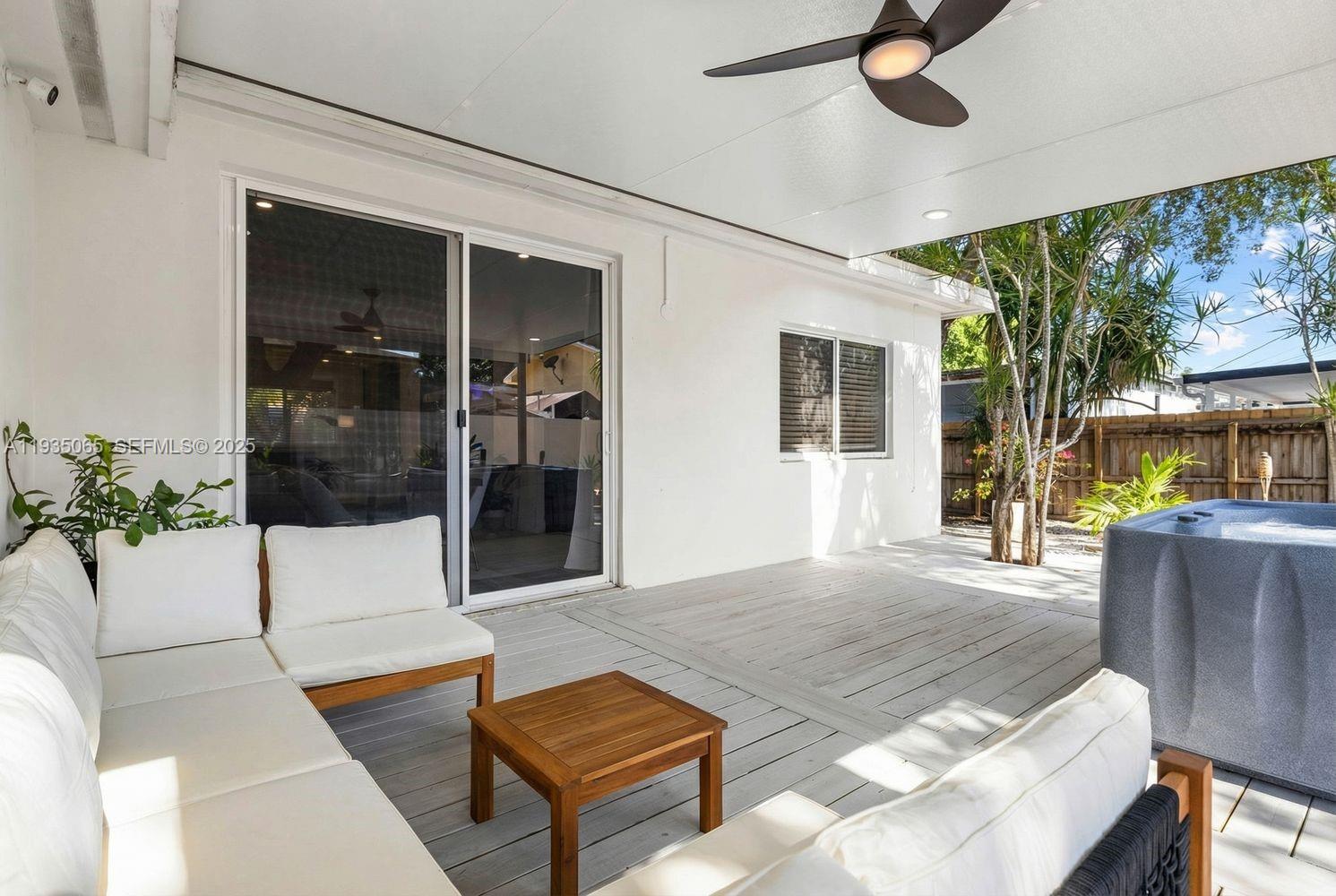 3260 Northwest 9th Street Miami, FL 33125 - Photo 30 of 33 a living room with furniture and a window