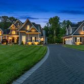 a front view of a house with yard