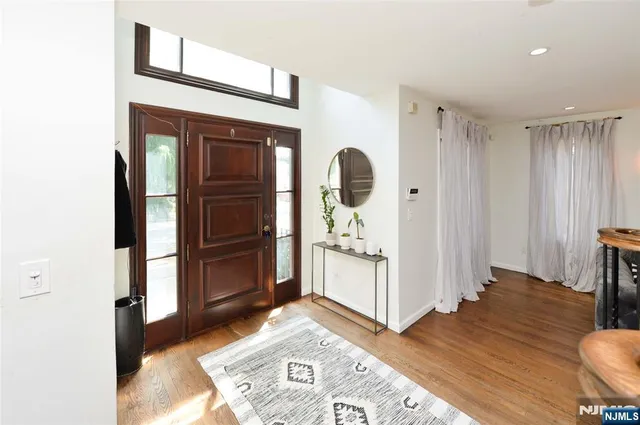 a view of livingroom with furniture and wooden floor