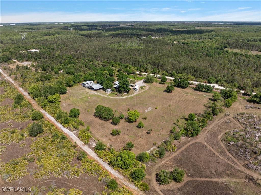 13951 Rod And Gun Club Road Fort Myers, FL 33913 - Photo 11 of 49 a view of a lake with a mountain