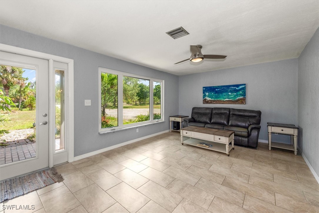 13951 Rod And Gun Club Road Fort Myers, FL 33913 - Photo 13 of 49 a view of workspace with furniture and window