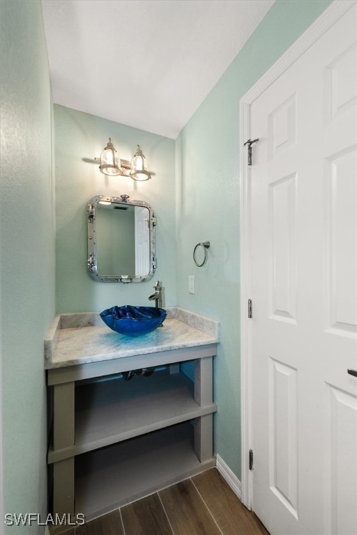 13951 Rod And Gun Club Road Fort Myers, FL 33913 - Photo 27 of 49 a bathroom with a sink and a mirror