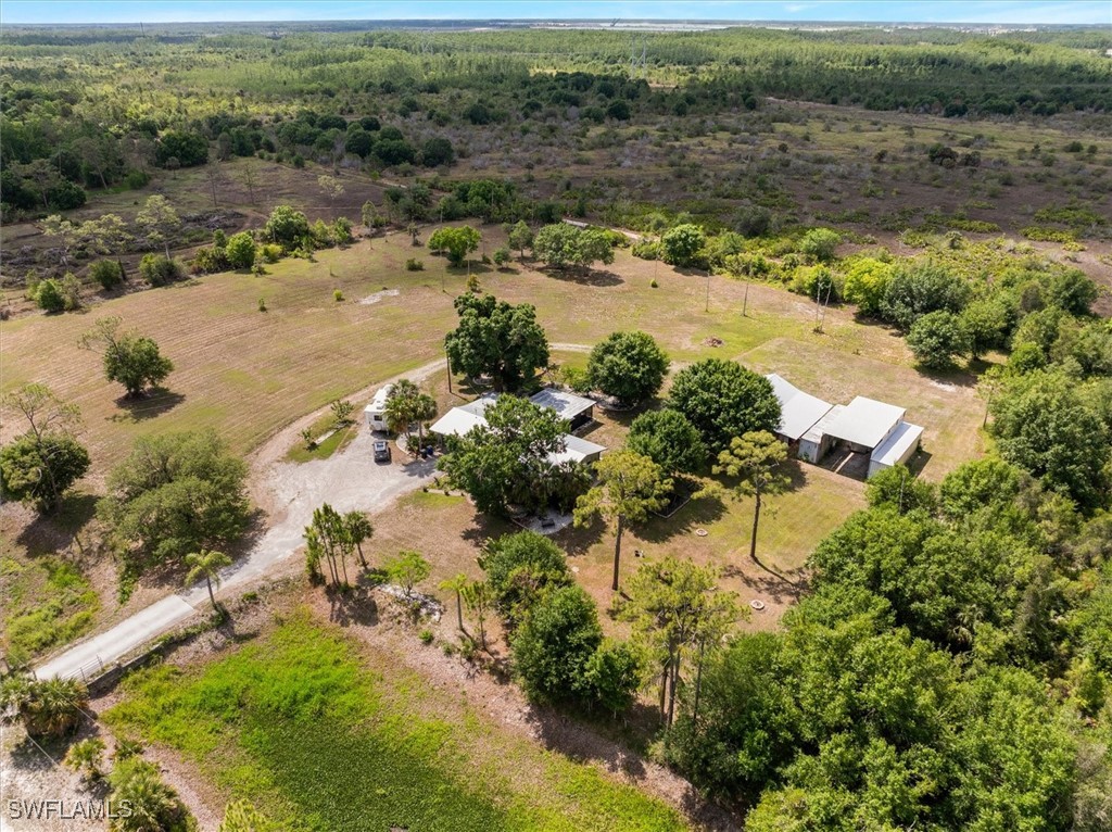 13951 Rod And Gun Club Road Fort Myers, FL 33913 - Photo 48 of 49 a view of a lake with beach and outdoor space