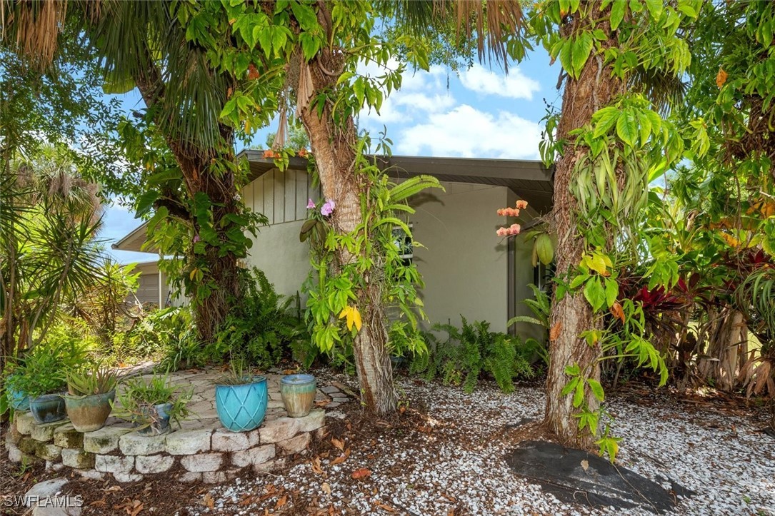 13951 Rod And Gun Club Road Fort Myers, FL 33913 - Photo 7 of 49 a view of a garden