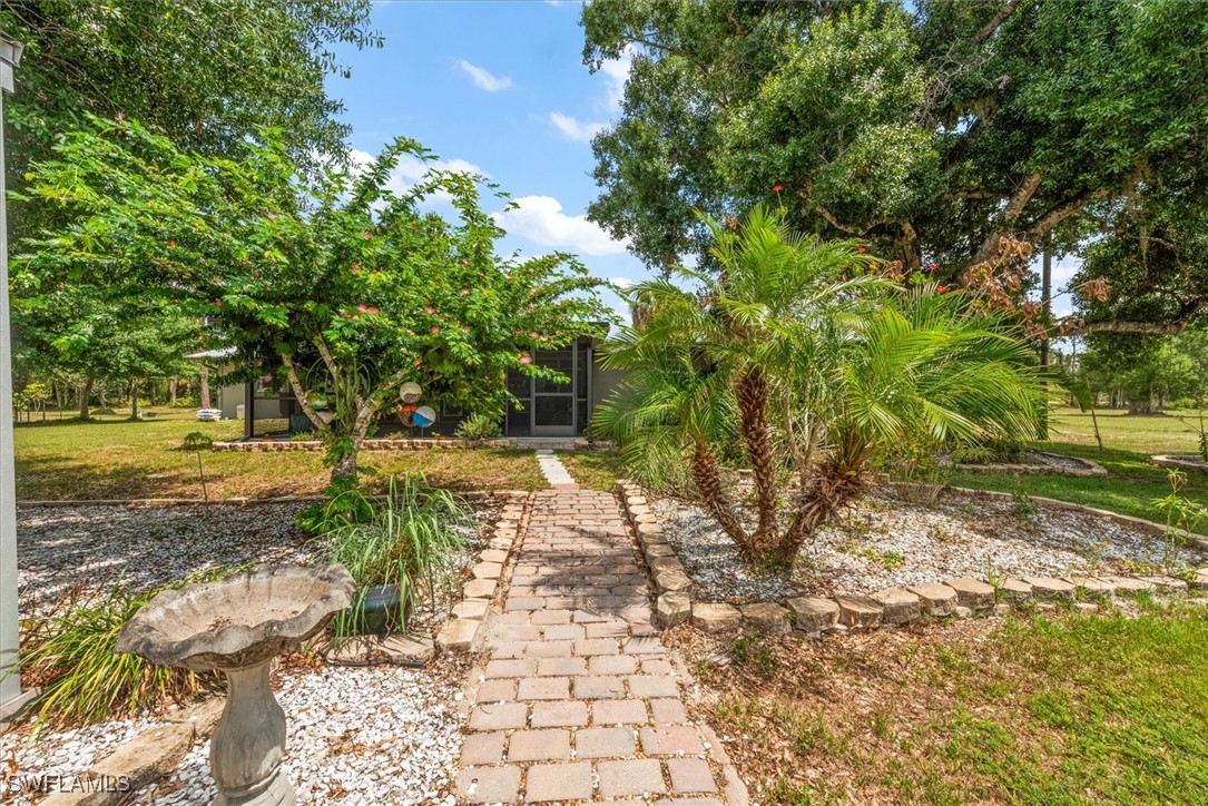 13951 Rod And Gun Club Road Fort Myers, FL 33913 - Photo 10 of 49 a pathway of a yard